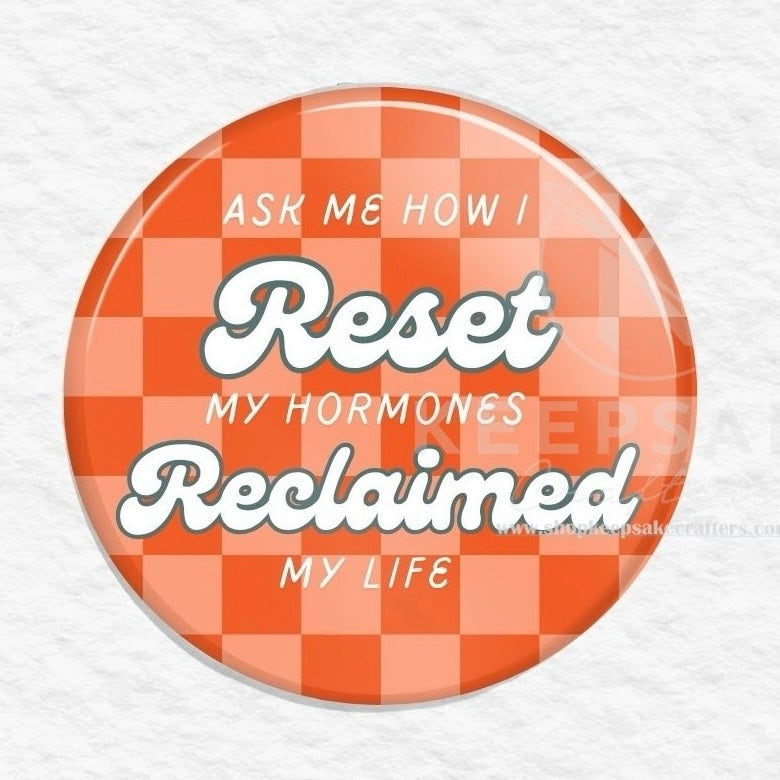 Round button with text 'Ask me how I reset my hormones, reclaimed my life' on a checkered background Ask Me About Skinny Drops Pin