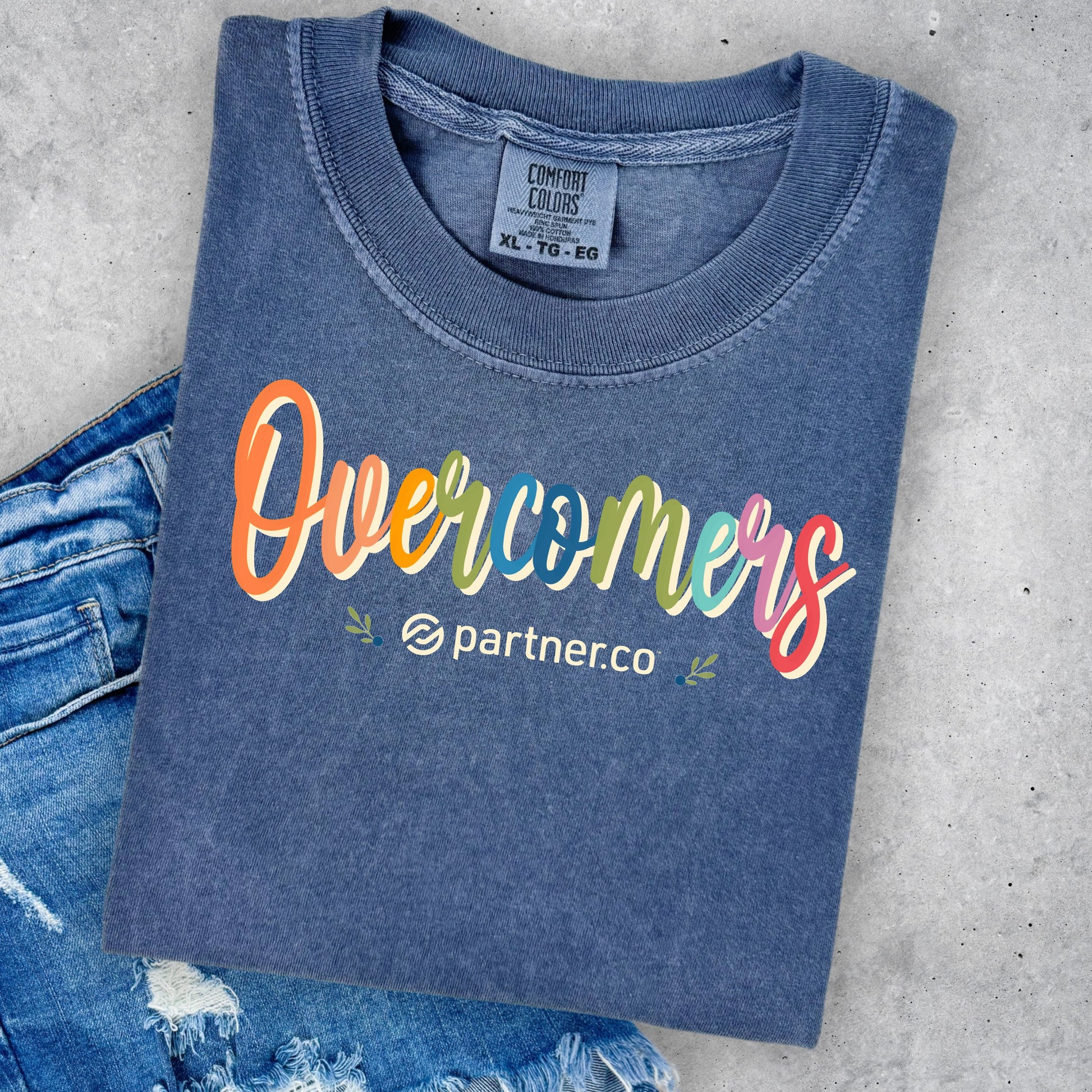 Colorful Overcomers design on Denim blue Comfort Colors T-shirt