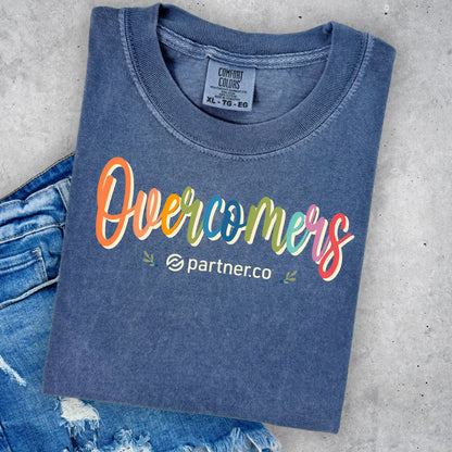 Colorful Overcomers design on Denim blue Comfort Colors T-shirt