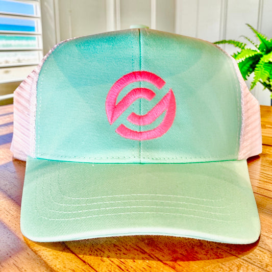 Mint green mesh-back trucker hat with bright coral pink embroidered logo