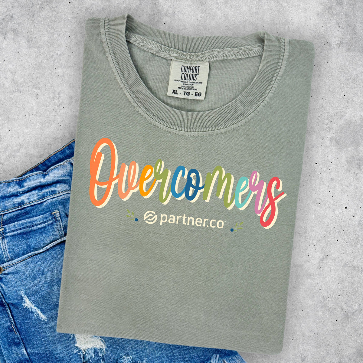 Overcomers Colorful Comfort Colors Tee – Sandstone